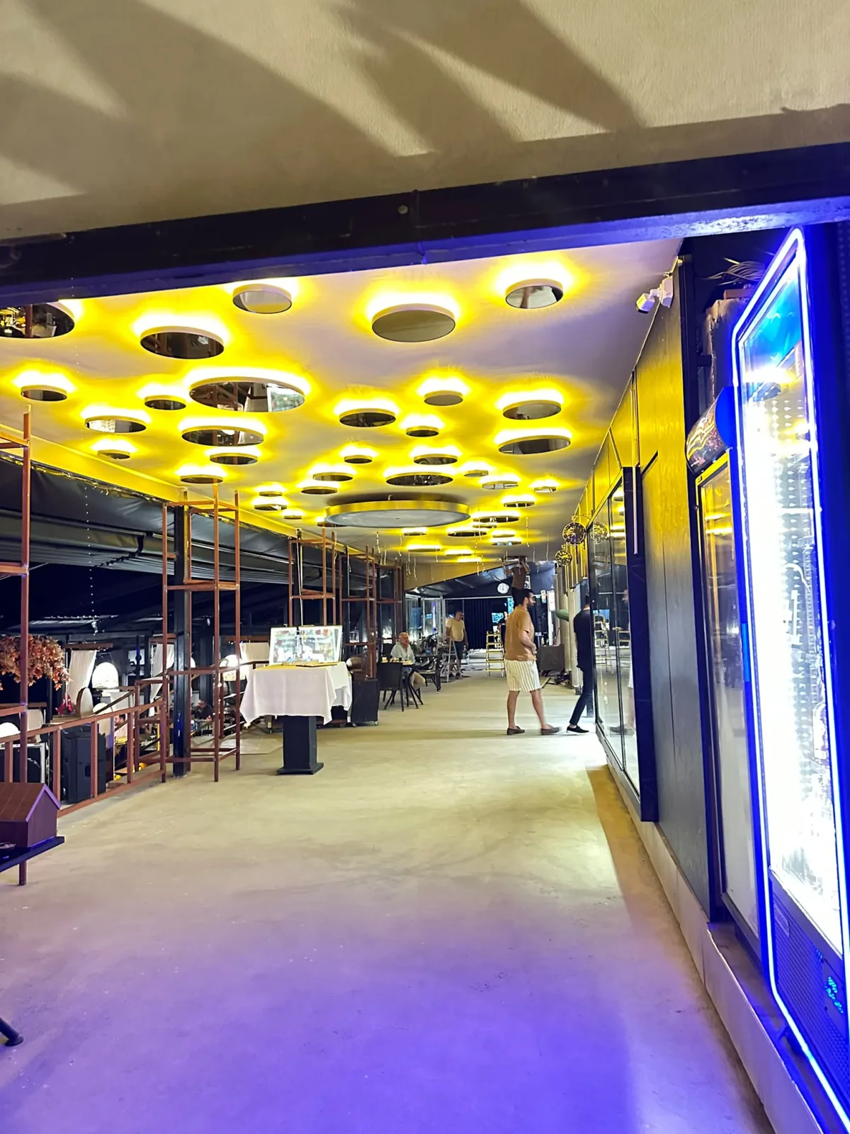 Decorative restaurant ceiling with circular LED niches